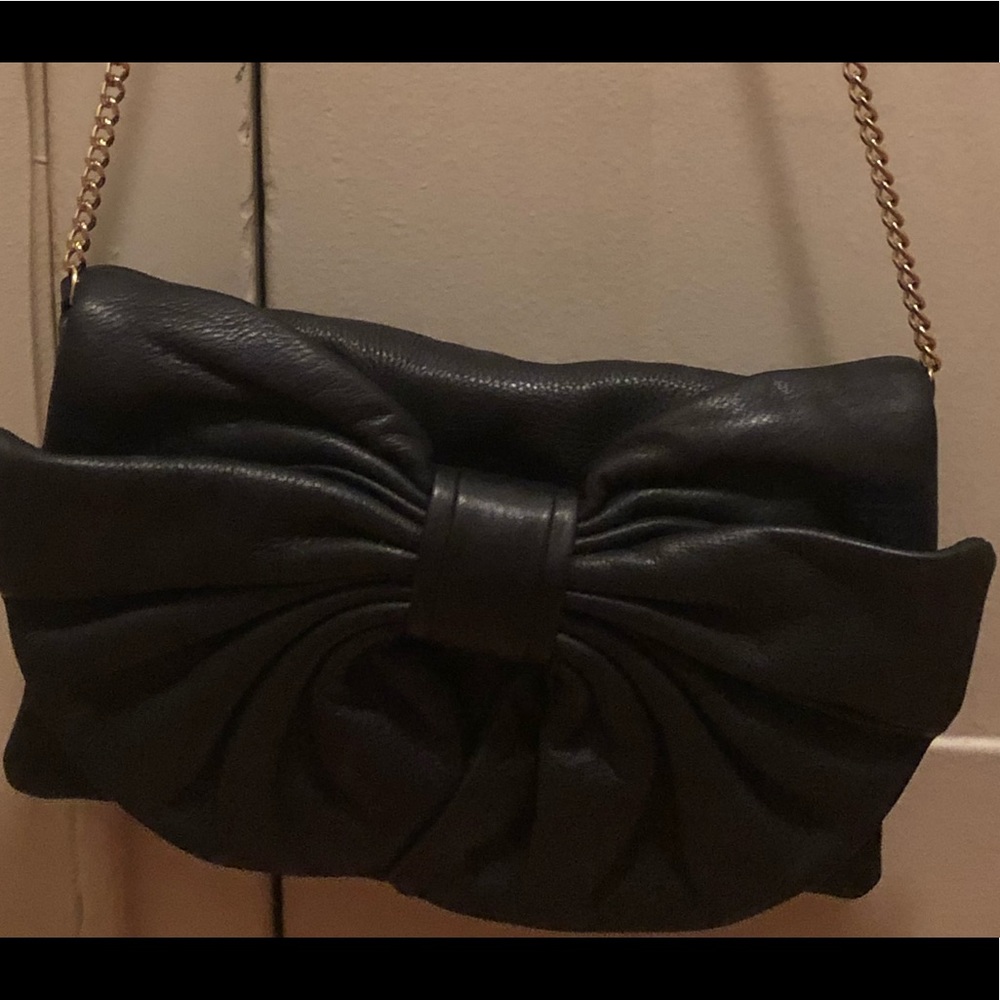 Beautiful Red Valentino black leather crossbody with large bow.
